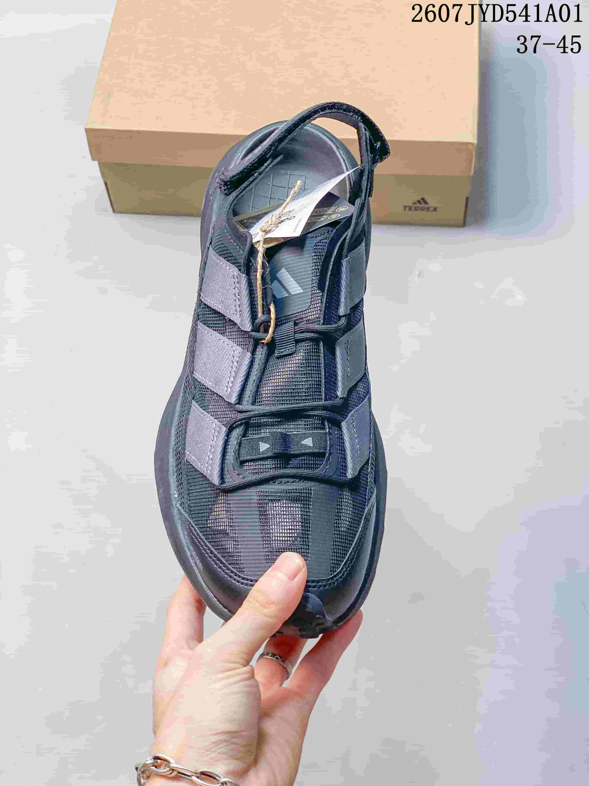 Top view of a dark gray closed-toe outdoor shoe with adjustable straps