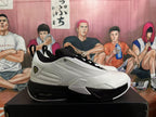 Side profile of a white and black Jordan sneaker showing the textured upper, padded collar and visible heel unit.