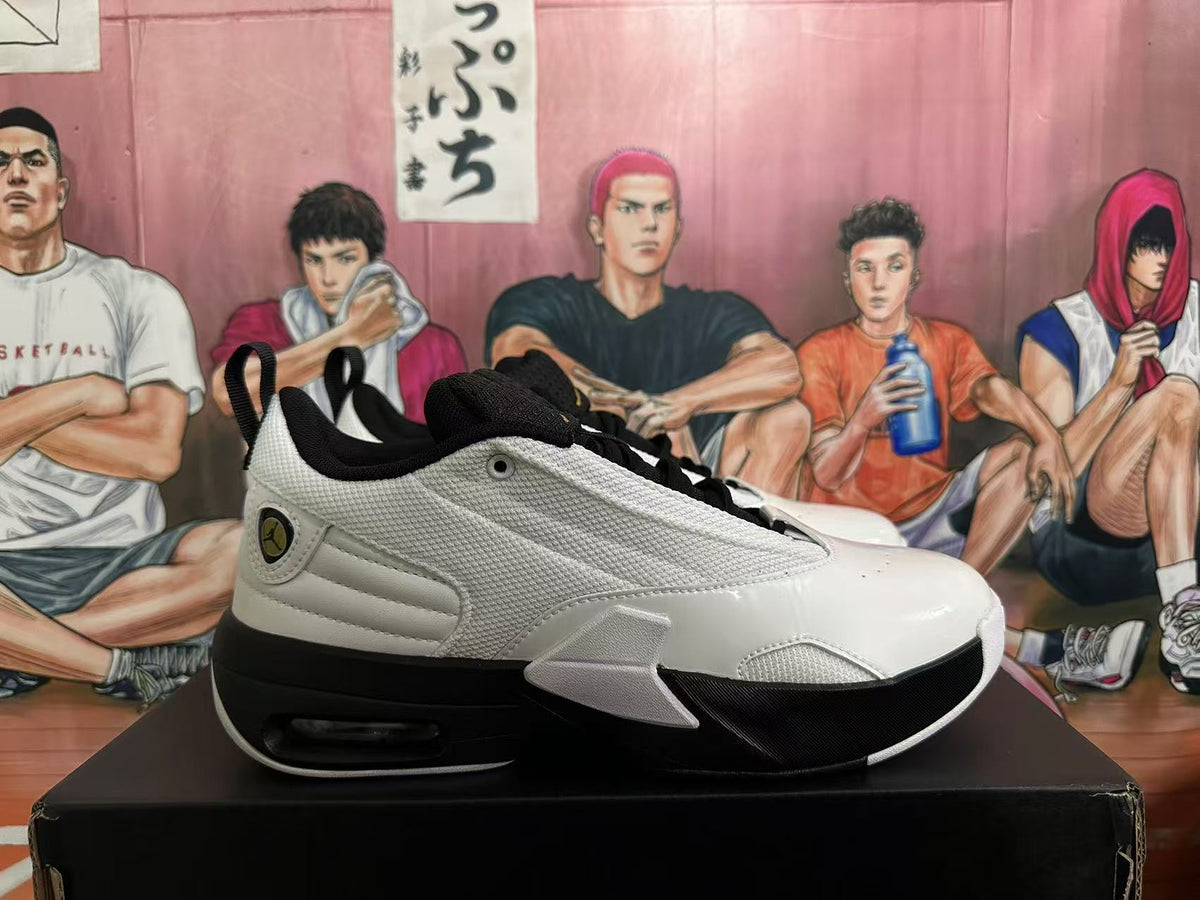 Side profile of a white and black Jordan sneaker showing the textured upper, padded collar and visible heel unit.