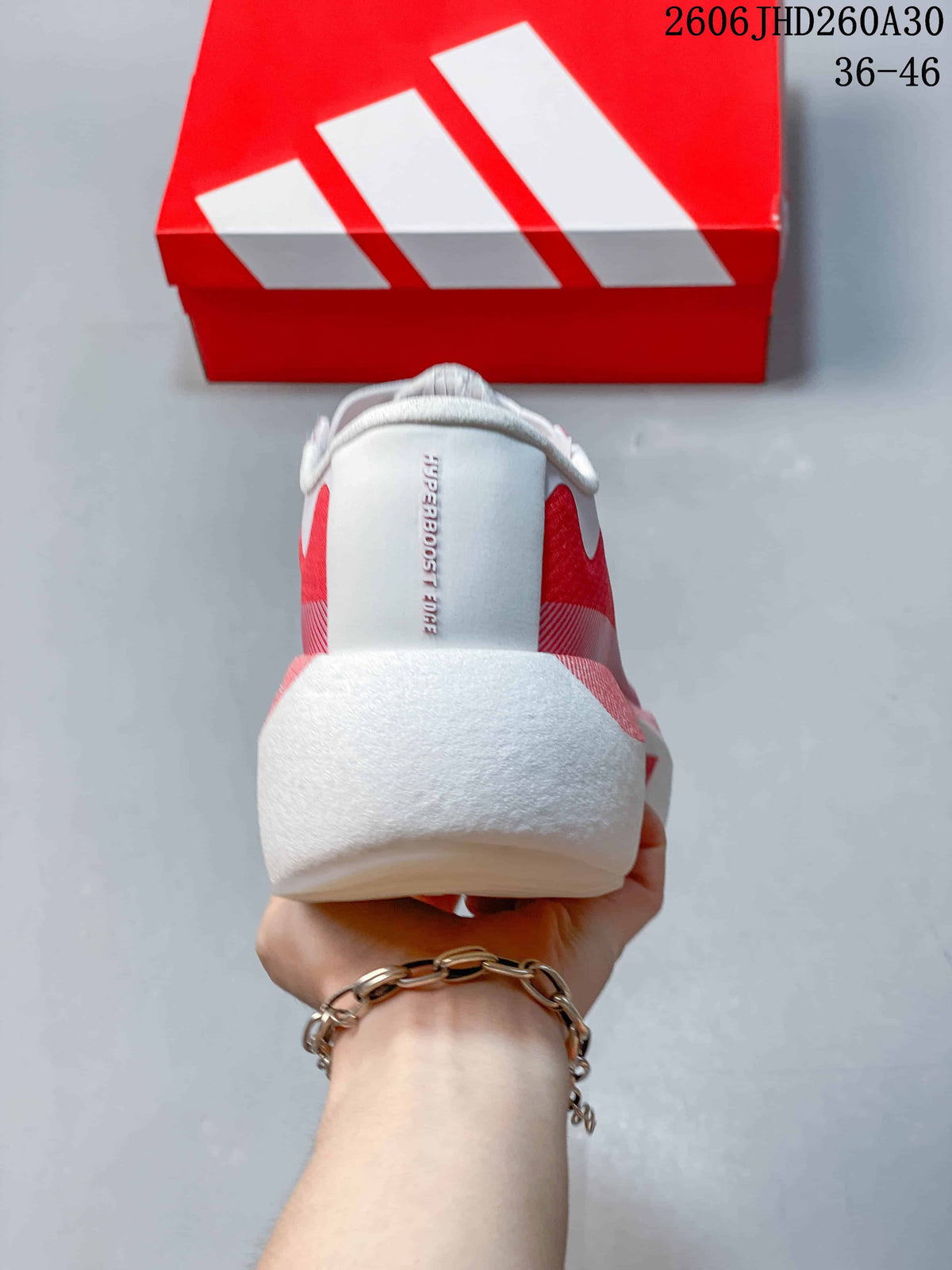 Rear view of the shoe showing the heel and Hyperboost Edge M name
