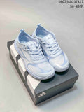 Pair of crystal blue adidas FOS GROUNDFLOW sneakers displayed on an adidas shoebox.