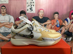 Side view showing the camouflage-style Nike Swoosh and layered panels