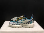 Profile view showing the teal mesh upper, graphic side overlays, lace system, and thick outsole.