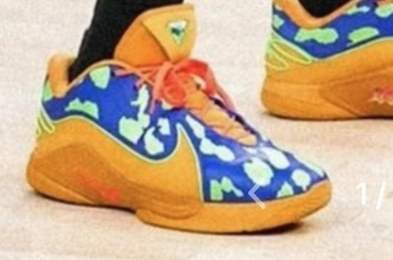 Nike LeBron 22 basketball shoe in blue and orange with patterned panels