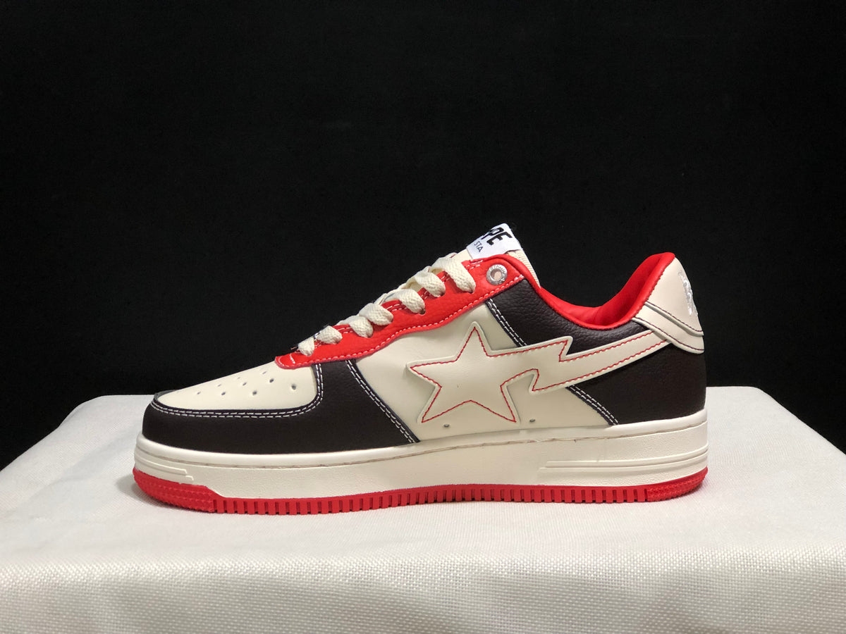 Full side profile showing the low-top construction, star-shaped side detail, layered sole, and red outsole.