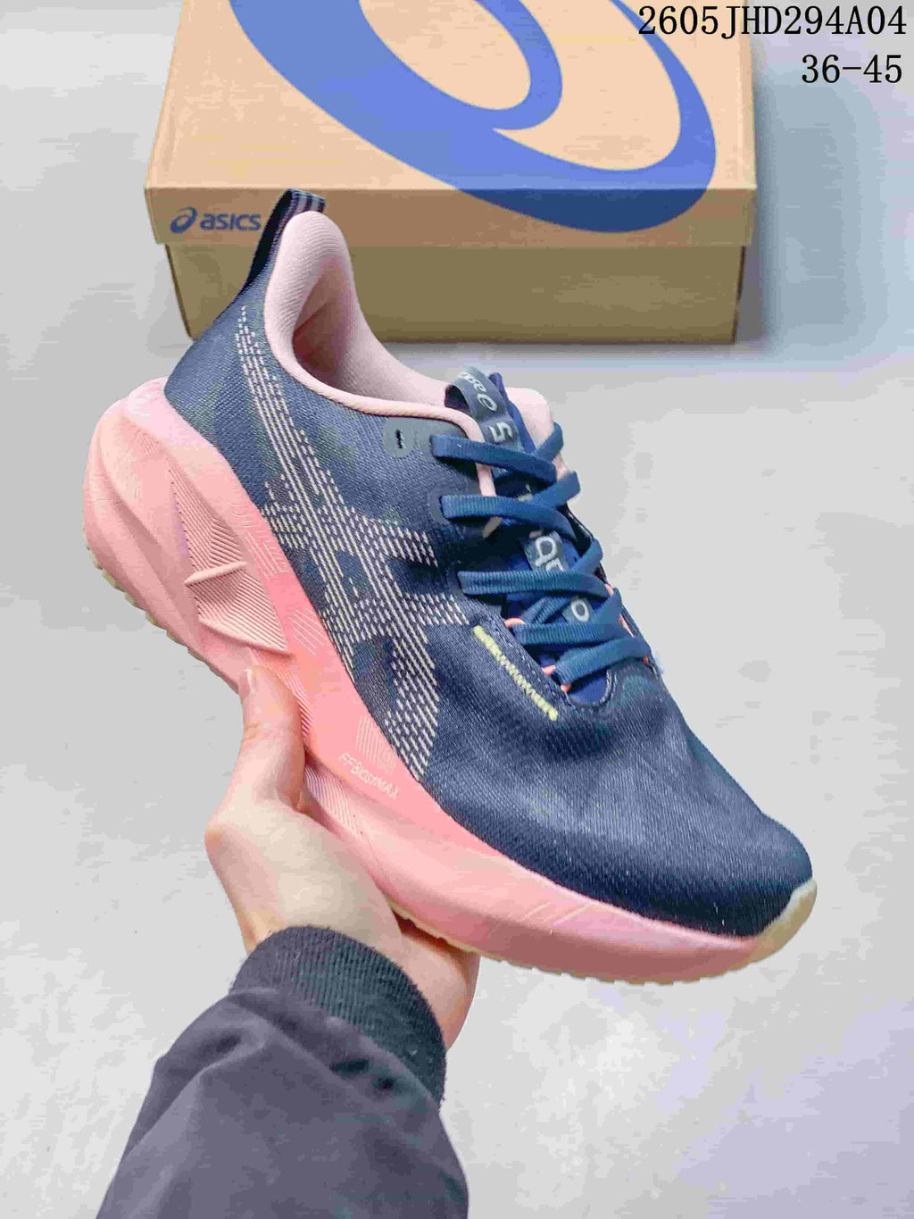 Navy and pink ASICS NOVABLAST 5 LE running shoe