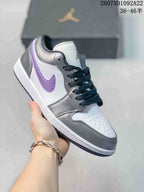 White and gray low-top Jordan sneaker with a purple Swoosh and black laces.