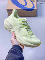 Pale yellow and white ASICS NOVABLAST 5 LE running shoe