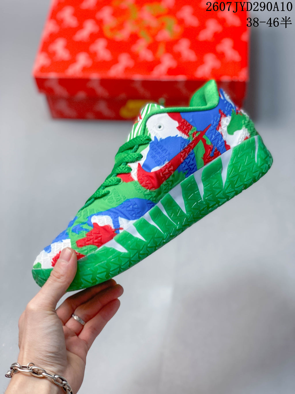 Side view of the multicolor Nike Ja 3 sneaker with a contrasting Swoosh and green outsole.