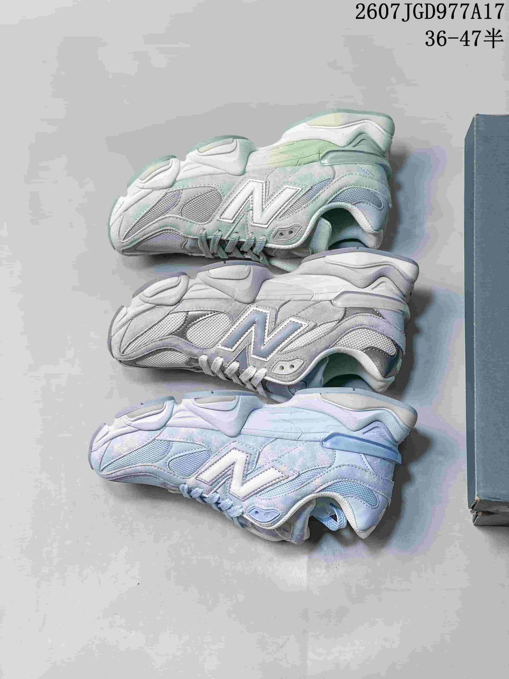Three views of the light-colored New Balance sneakers arranged to show the side profiles, layered panels and thick soles.