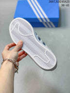 Outsole view showing the sneaker's repeating textured tread pattern.