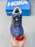 Front view showing the textured toe box, black laces, and padded collar.