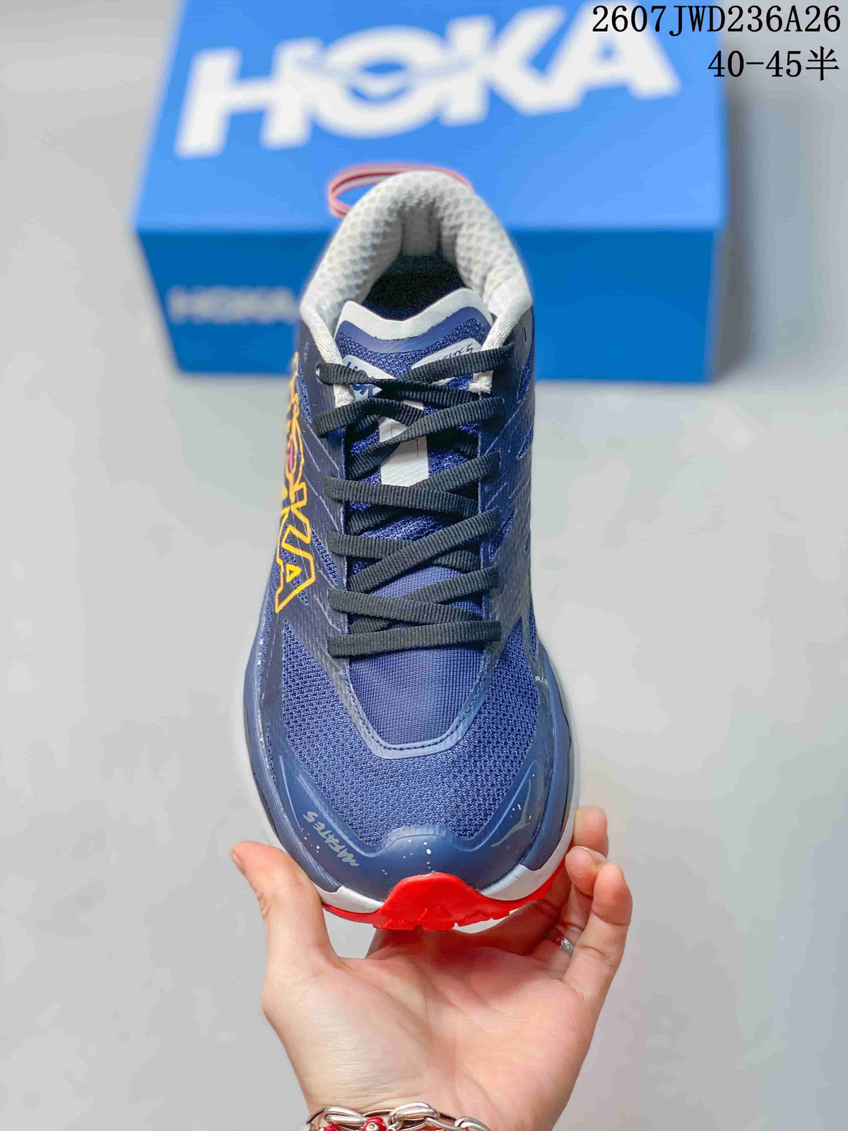 Front view showing the textured toe box, black laces, and padded collar.