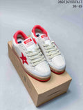 Pair of white and red Golden Goose Ball Star low-top sneakers displayed on a shoebox, with style code 2607TGY557A17 and size range 36–45 visible.