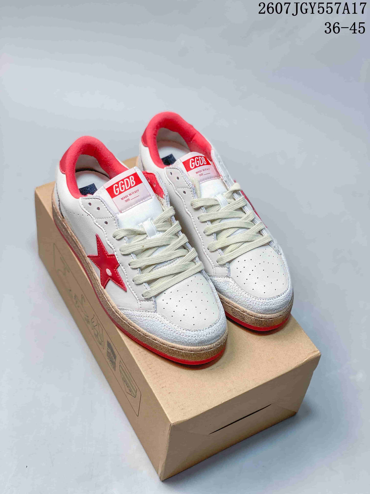 Pair of white and red Golden Goose Ball Star low-top sneakers displayed on a shoebox, with style code 2607TGY557A17 and size range 36–45 visible.