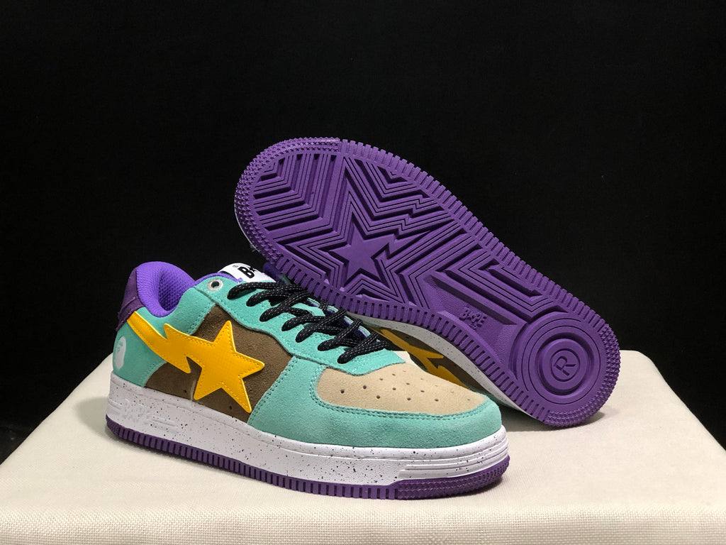 Angled view showing the mint green and brown upper, yellow star-shaped side detail, speckled white midsole, and purple outsole.