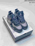 Pair of dark charcoal and black Jordan Air Jordan 4 Retro sneakers displayed on a shoebox.