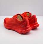 Rear three-quarter view showing the heel structure, branding, and outsole edge.