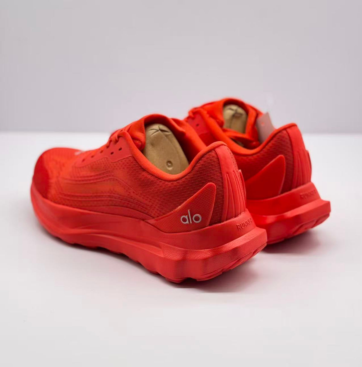 Rear three-quarter view showing the heel structure, branding, and outsole edge.