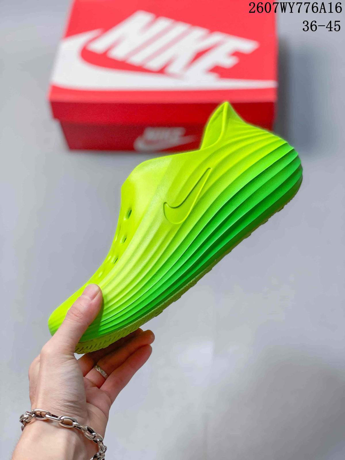 Side profile of a neon green clog showing layered side ridges, ventilation holes, and a dark Nike Swoosh.