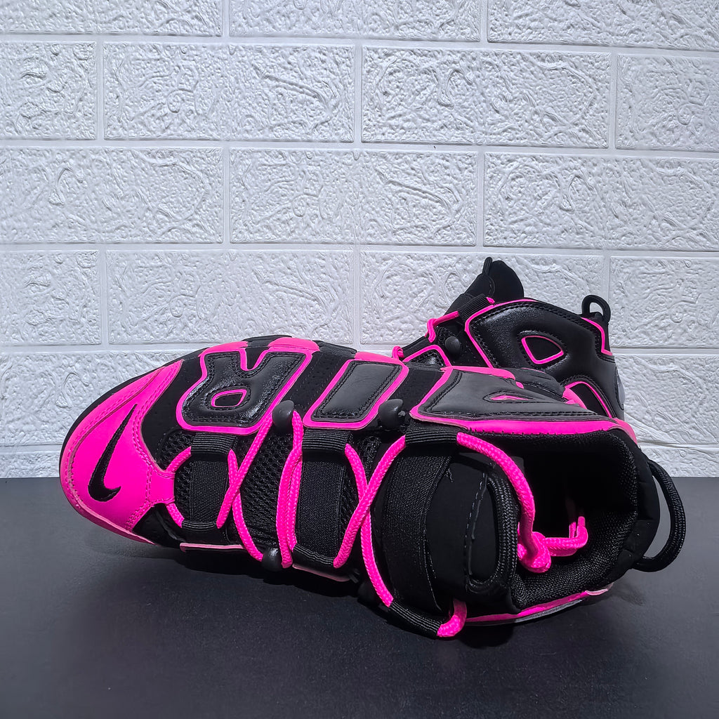Top view showing pink laces and black uppers