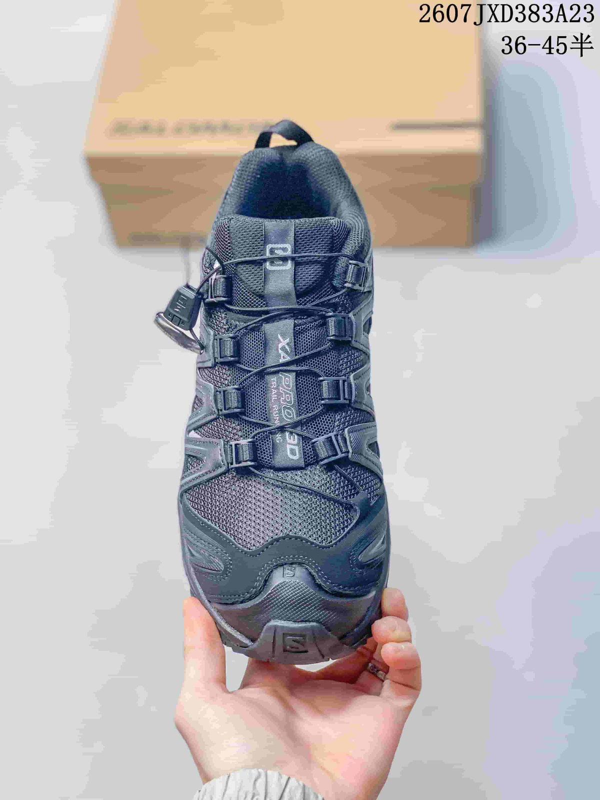 Top view of the gray sneaker showing the mesh toe area, layered lace hardware, and XA PRO 3D tongue branding.