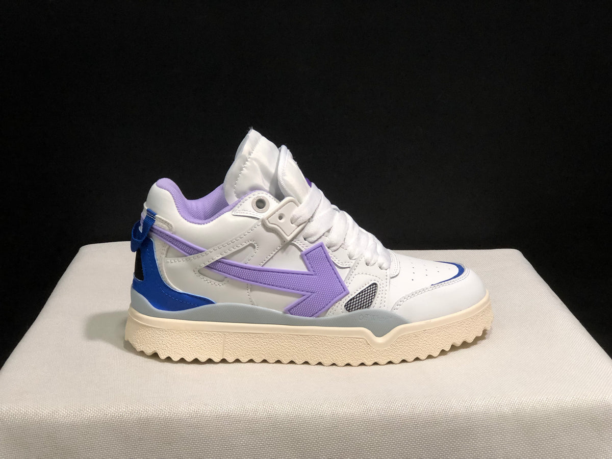 Opposite side profile of the white sneaker showing layered panels, lavender detailing, blue heel accent and cream outsole.