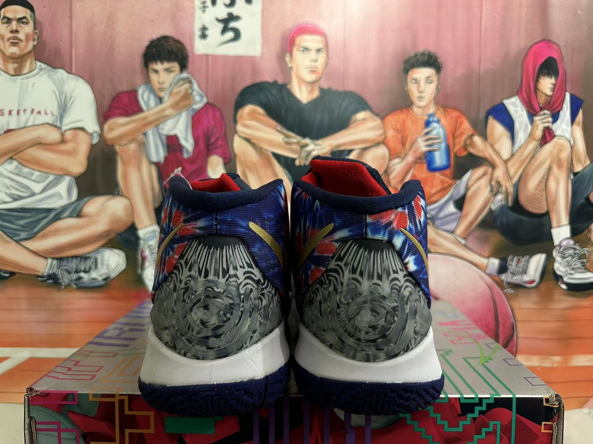 Rear view of the basketball shoes showing the heels and dark outsoles.