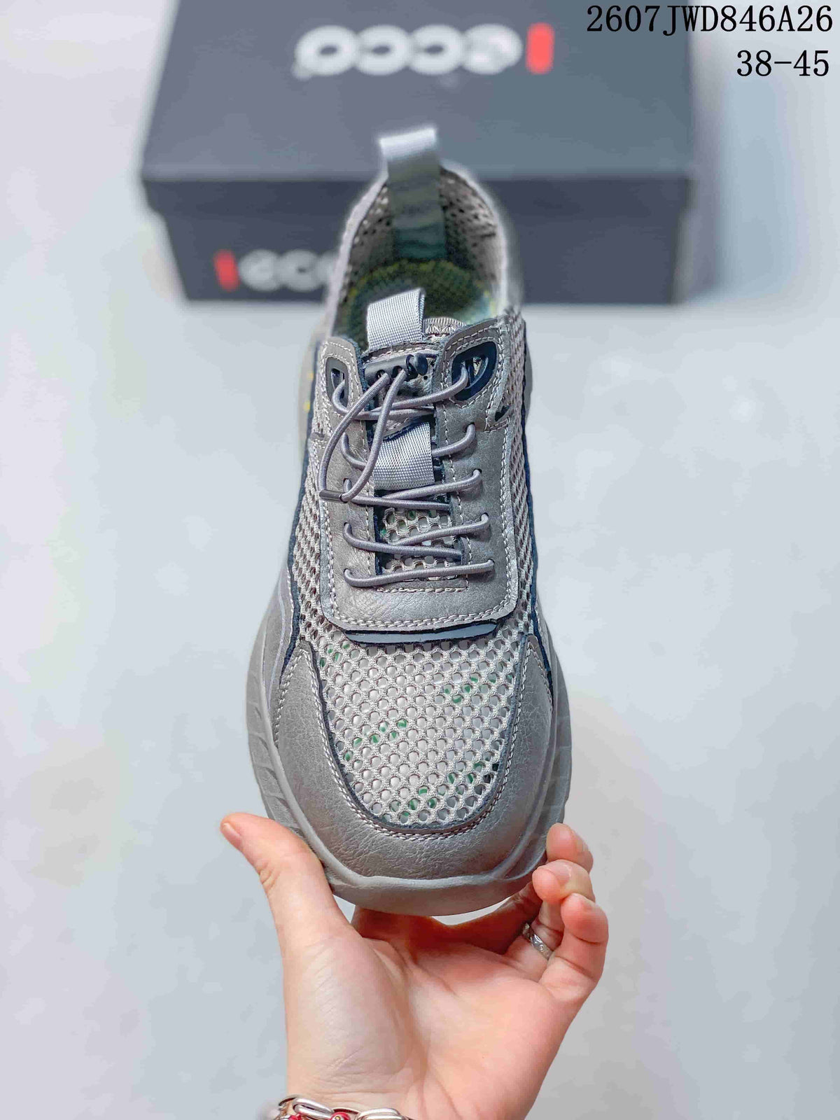 Top view of the grey sneaker showing the mesh toe panel, laces and padded tongue.