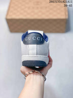 Rear view showing the white perforated heel, navy collar lining, and Gucci branding.