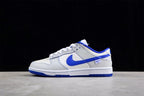 Opposite side profile showing the white and blue color blocking and low-top silhouette.