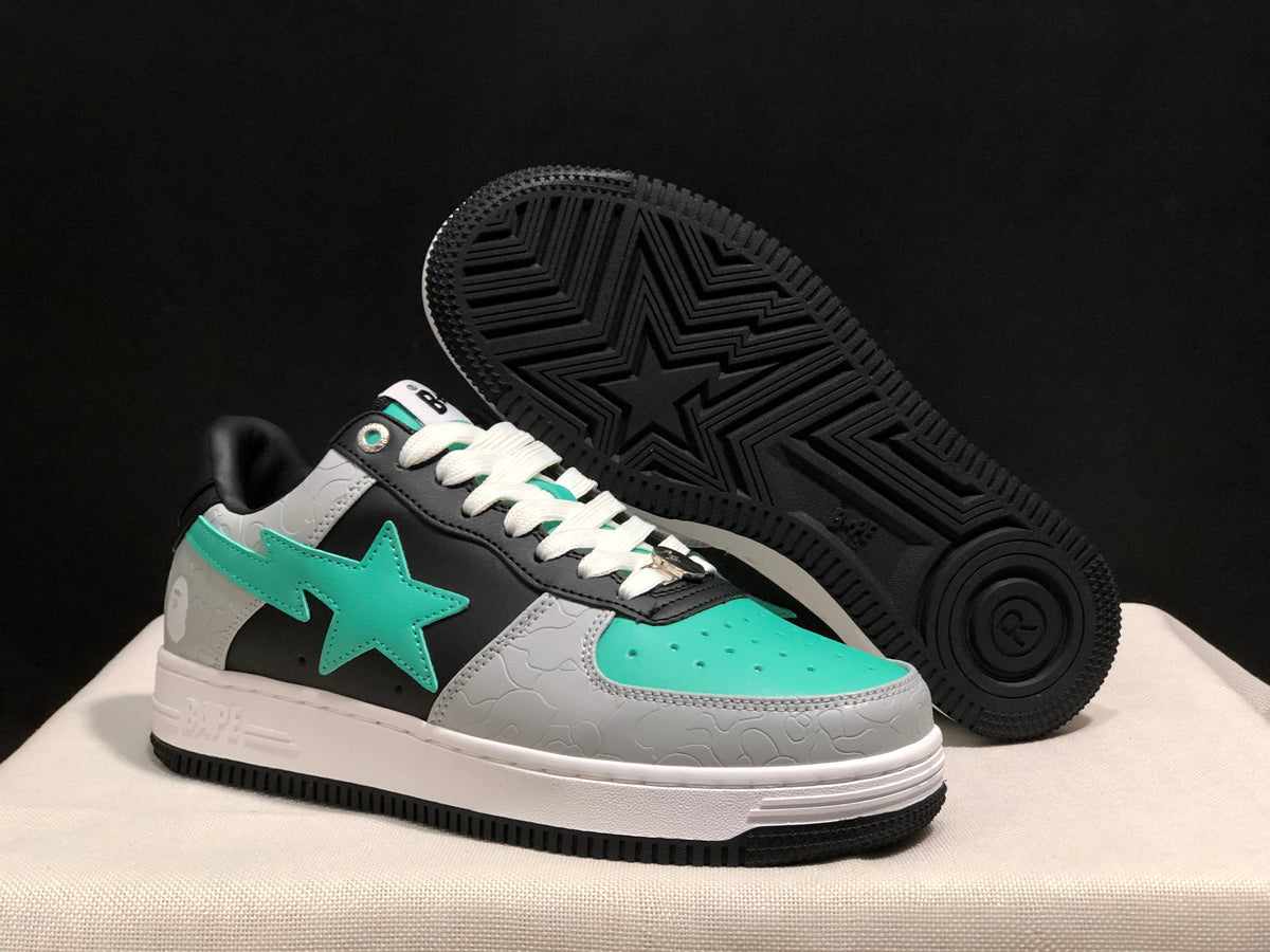 BAPE Bape Sta sneakers shown from the front and outsole, with turquoise, grey, black and white panels.