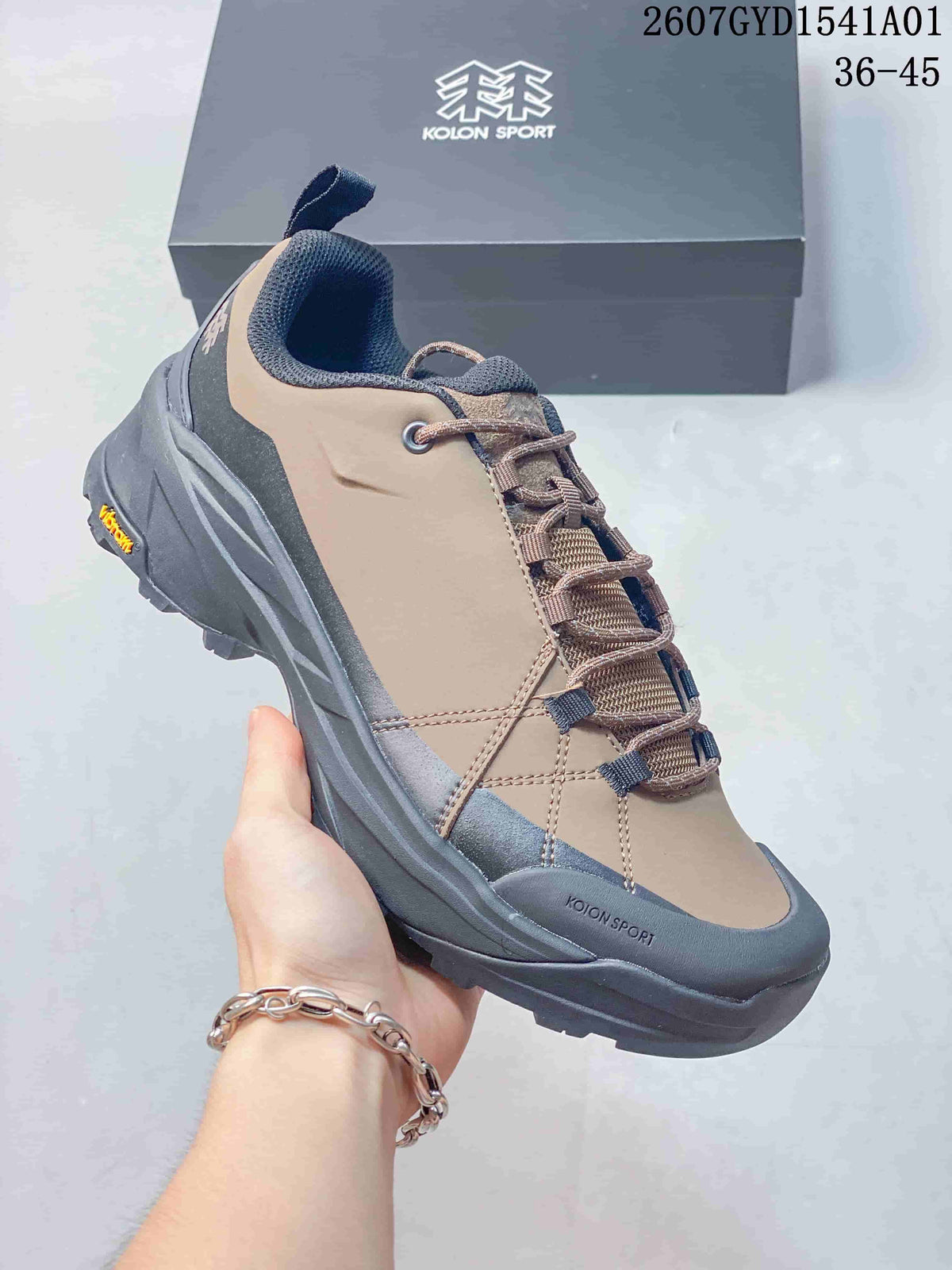 Close-up of the brown Kolon Sport sneaker showing its laces and side panels