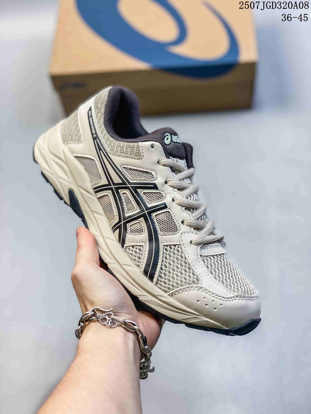 Angled side view of the gray ASICS Gel-Contend 4 sneaker showing the layered mesh panels, contrasting side branding, midsole, and outsole.