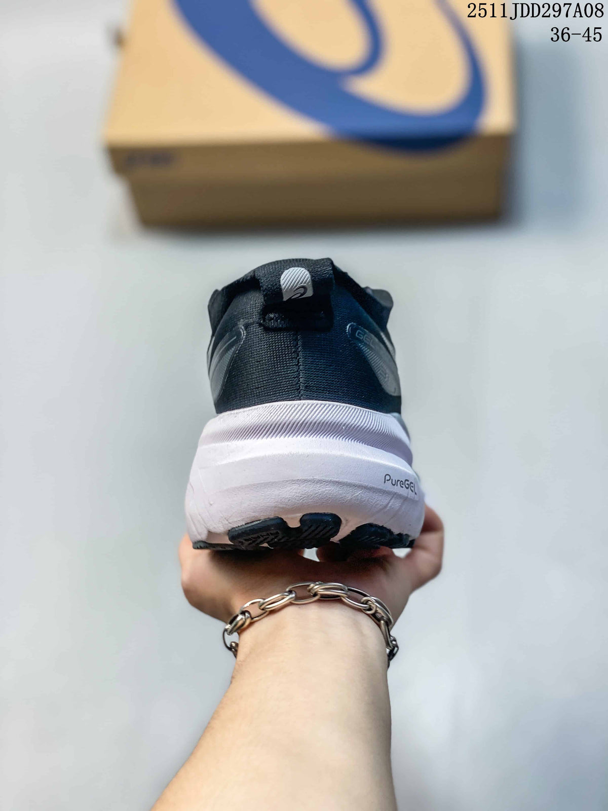 Rear view of a navy and white ASICS sneaker with a white midsole and visible PureGEL marking.