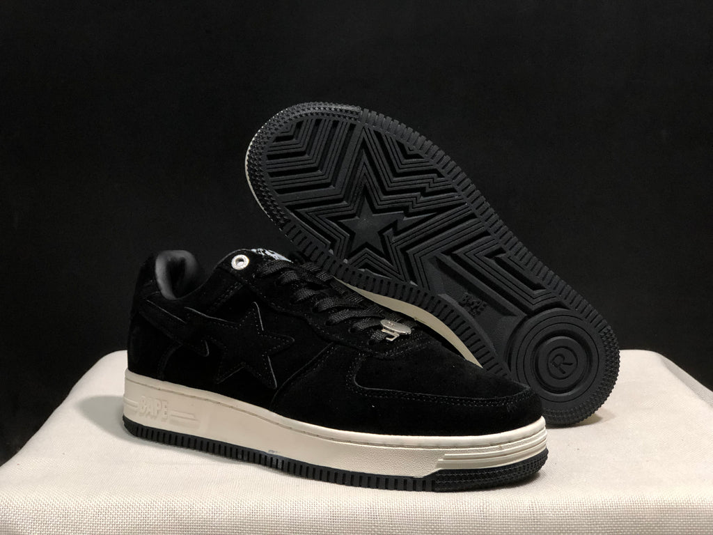 Angled view showing the black outsole tread, star-shaped traction pattern and white midsole.