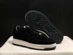 Angled view showing the black outsole tread, star-shaped traction pattern and white midsole.