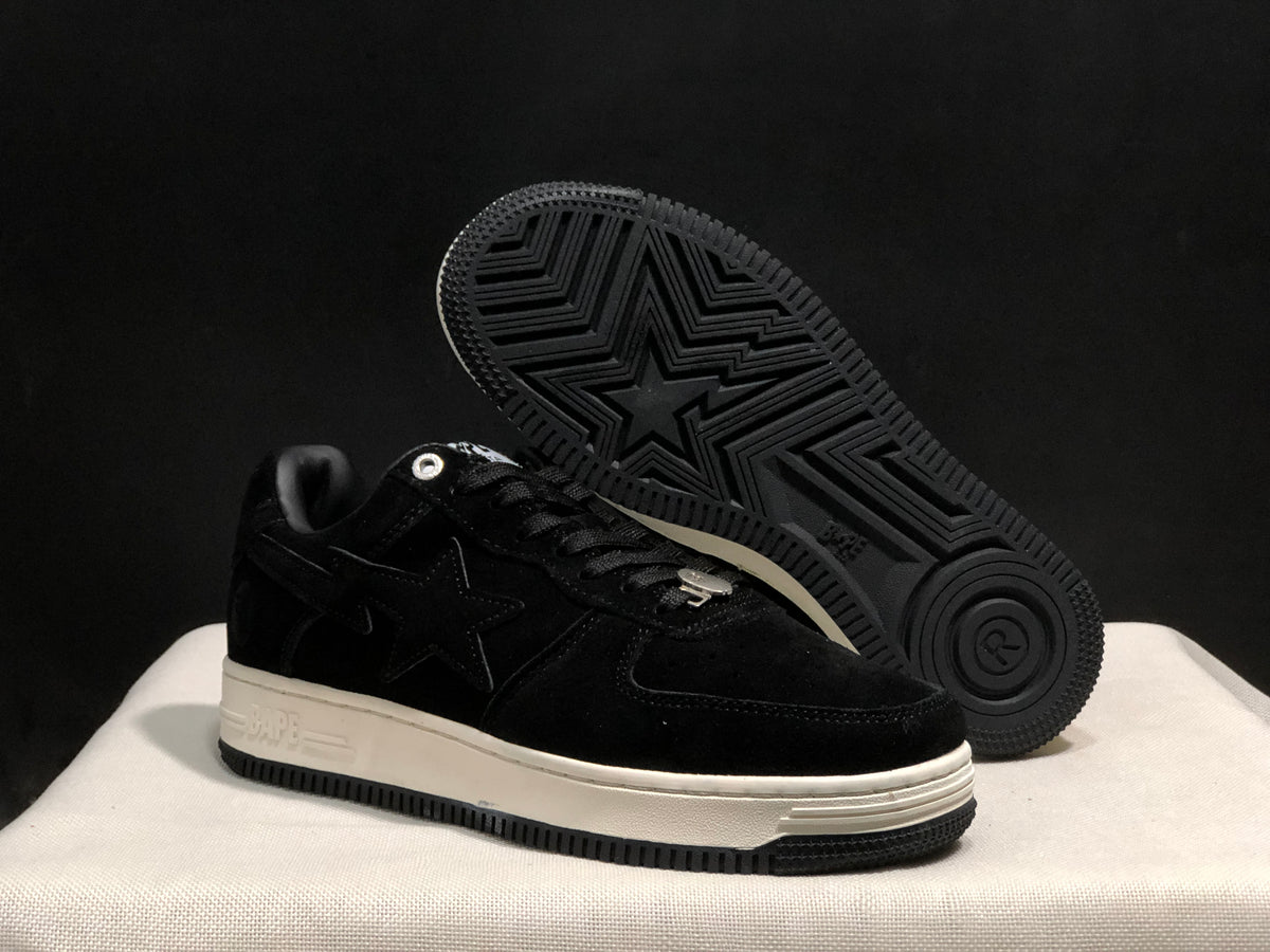 Angled view showing the black outsole tread, star-shaped traction pattern and white midsole.
