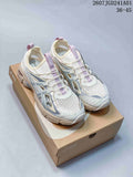 Pair of cream ASICS GT-2160 Breeze sneakers with lilac and blue-gray accents, shown on a shoebox