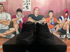 Front view of black Nike basketball shoes with laces