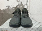 Front view of the dark Nike Kobe 6 shoes with textured uppers and lace-up closure