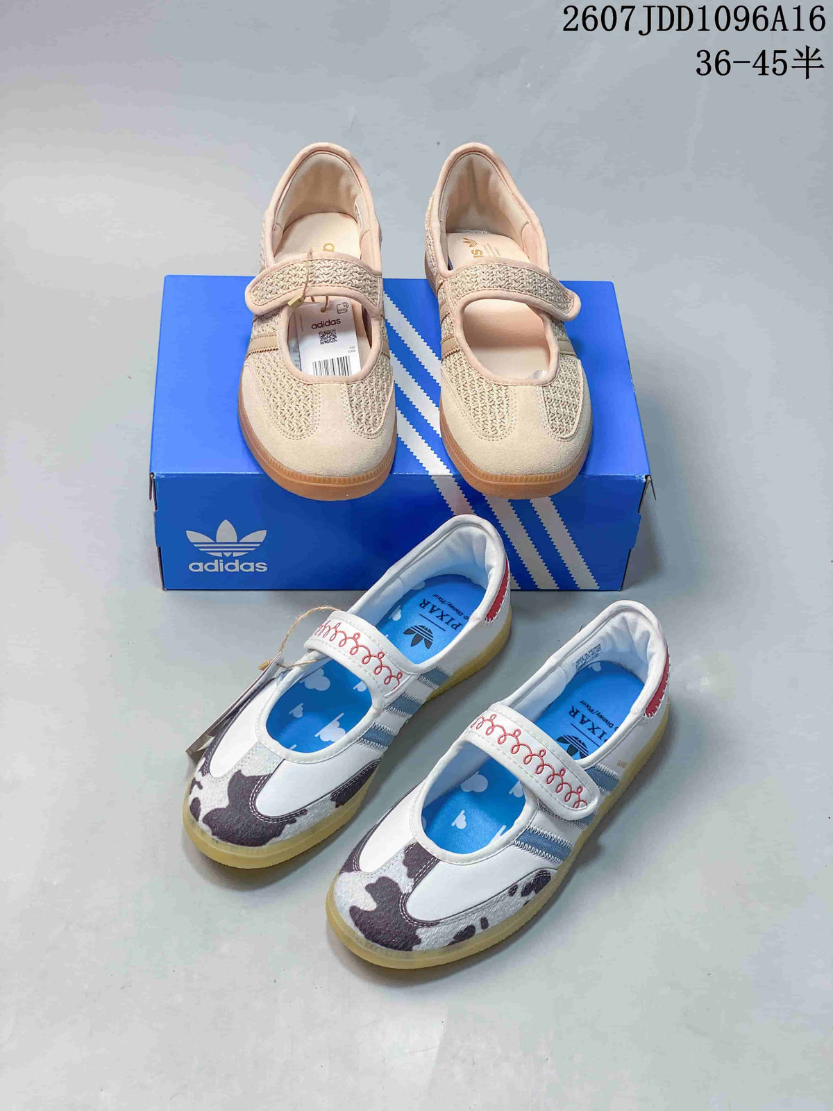 Both photographed colorways of the Adidas Samba Jane W sneaker arranged with an Adidas shoebox.