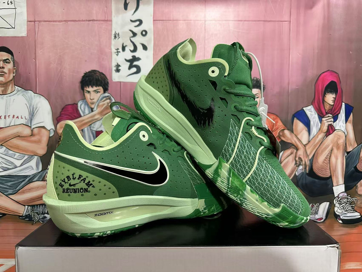 Pair of green Nike basketball shoes showing side panels, contrasting Swoosh, and outsole pattern.
