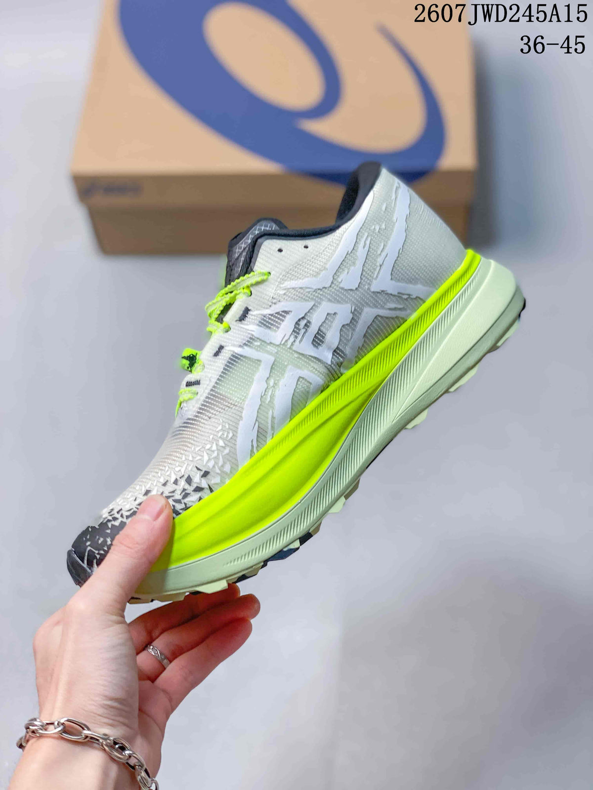 Side view of the white sneaker with neon yellow midsole accents, gray detailing, and layered upper panels.