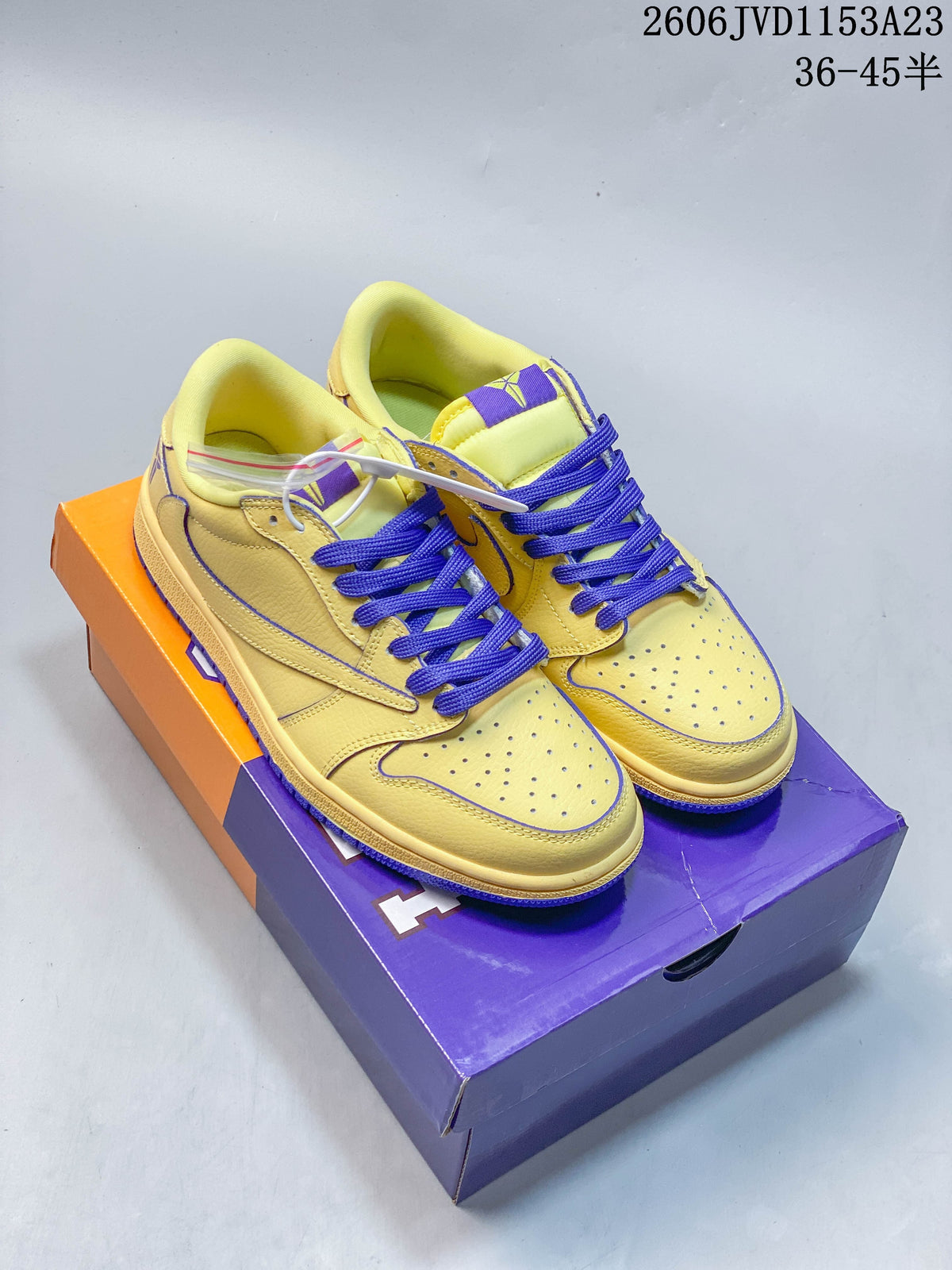 Yellow and purple low-top sneakers shown from above on a matching box