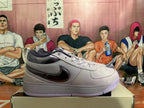 Side profile showing the dark Swoosh and textured gray panel