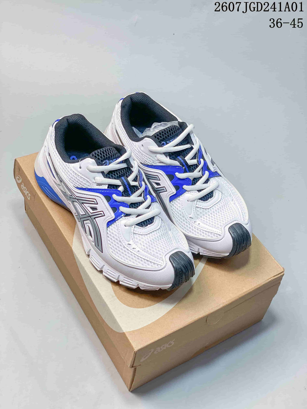 Pair of white and blue ASICS GEL-SD Lyte sneakers shown from above on a shoebox