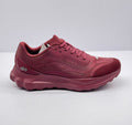 Side view of burgundy alo Runner sneakers showing the textured upper, lace closure, and layered sole.