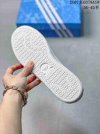 Close-up of the textured rubber outsole with Adidas branding.
