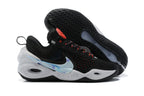 Black Nike Anthony basketball shoes with white sculpted soles and a pale blue accent.